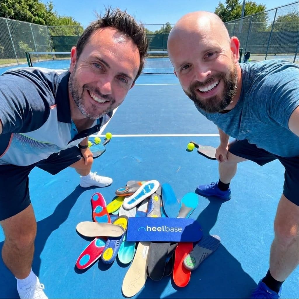 HeelBase founders testing insoles on a pickleball court