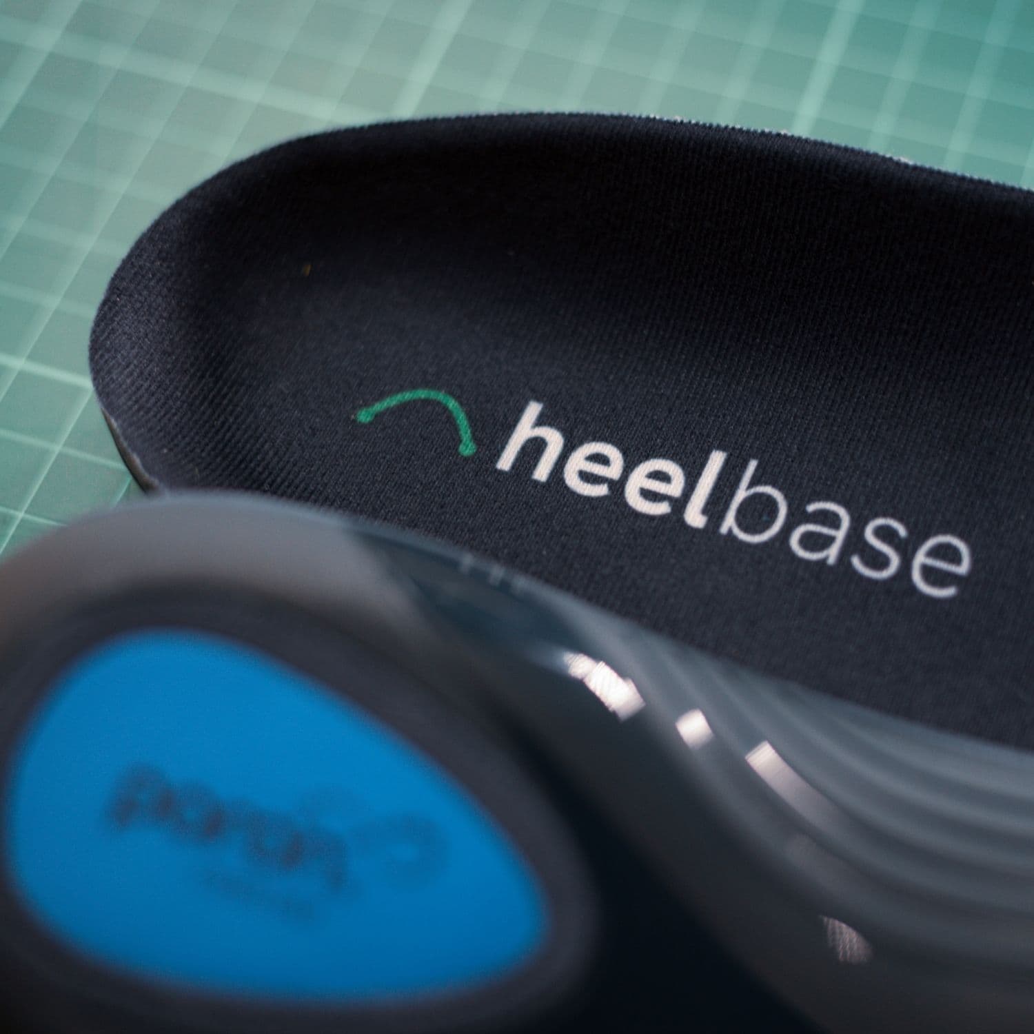 HeelBase logo and layered heel profile of the Apex insole
