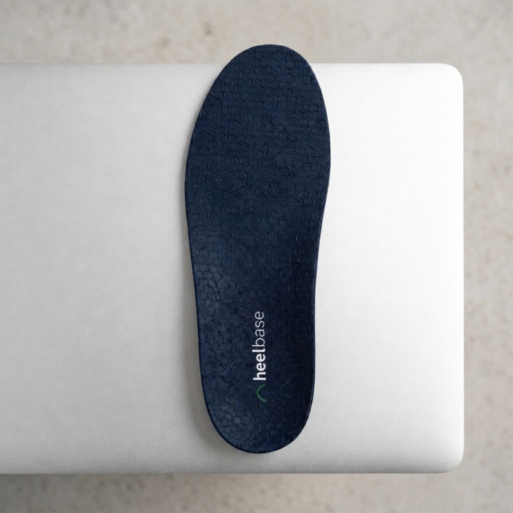 HeelBase Apex insole top view on mixed background