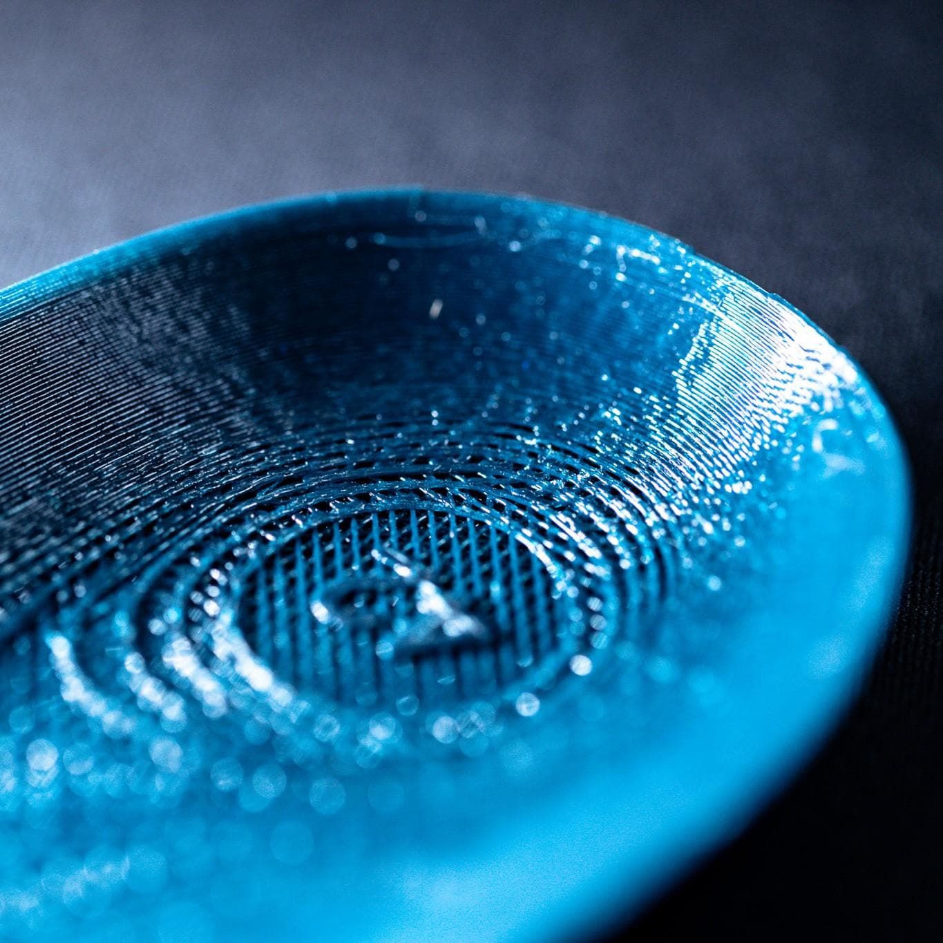 Interior close-up of the HeelBase Drive insole's deep printed heel cup and lattice base