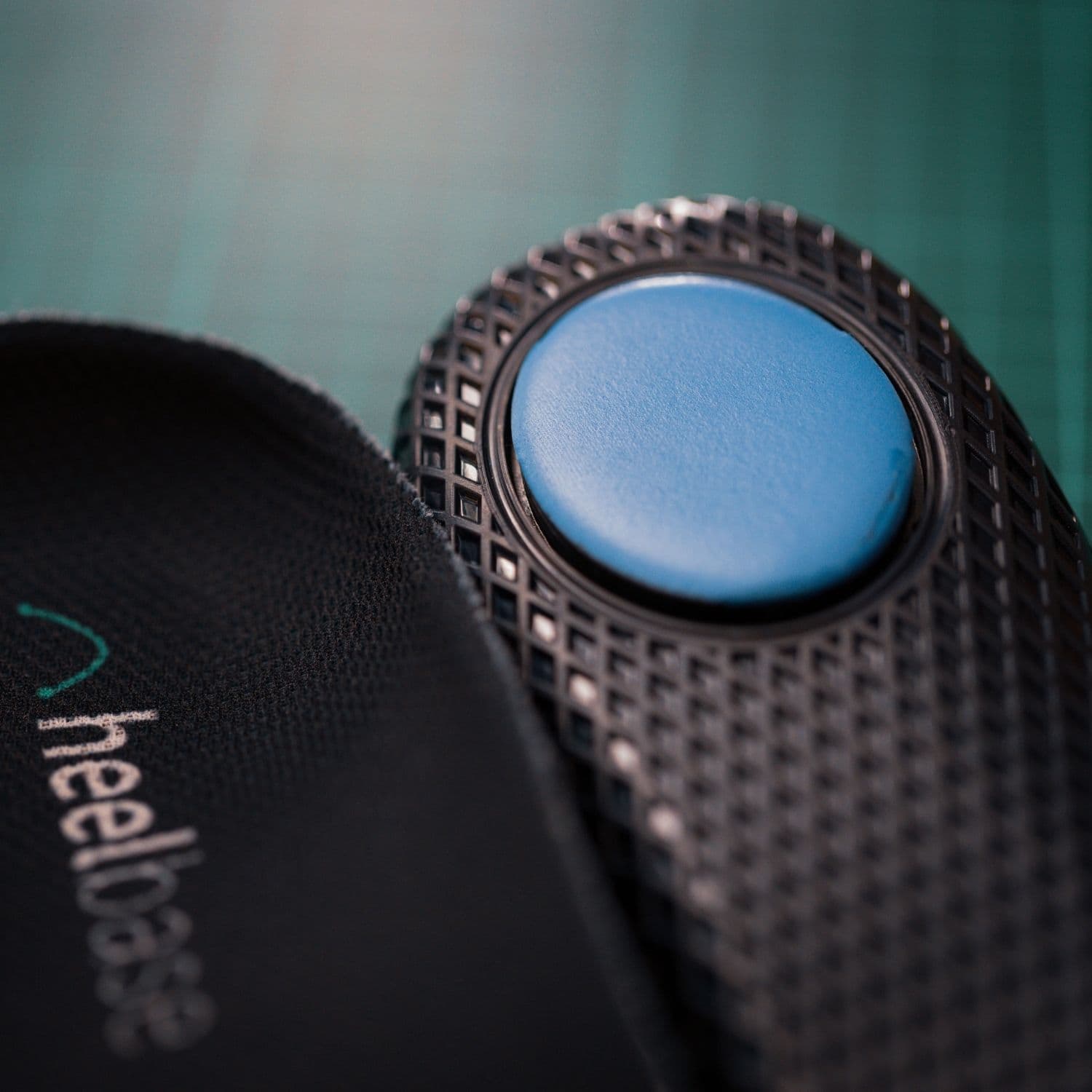 Close-up of the blue cushioned heel pad beneath a HeelBase Stance insole
