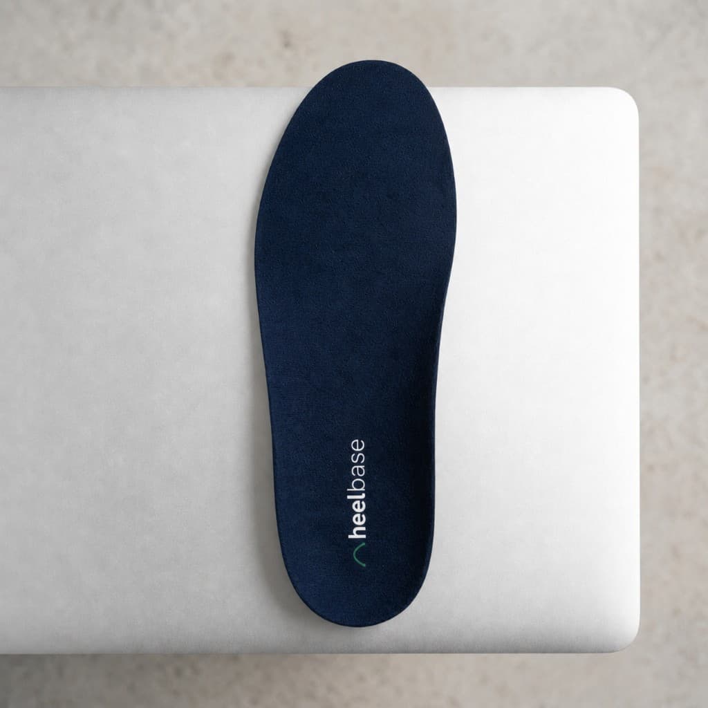 HeelBase Stance insole top view on mixed background