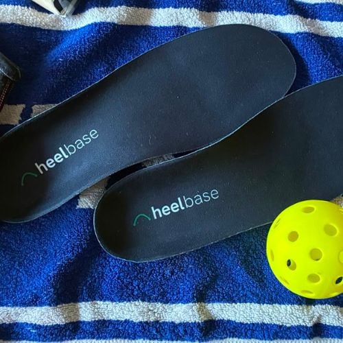 Customer photo showing Apex insoles on a towel